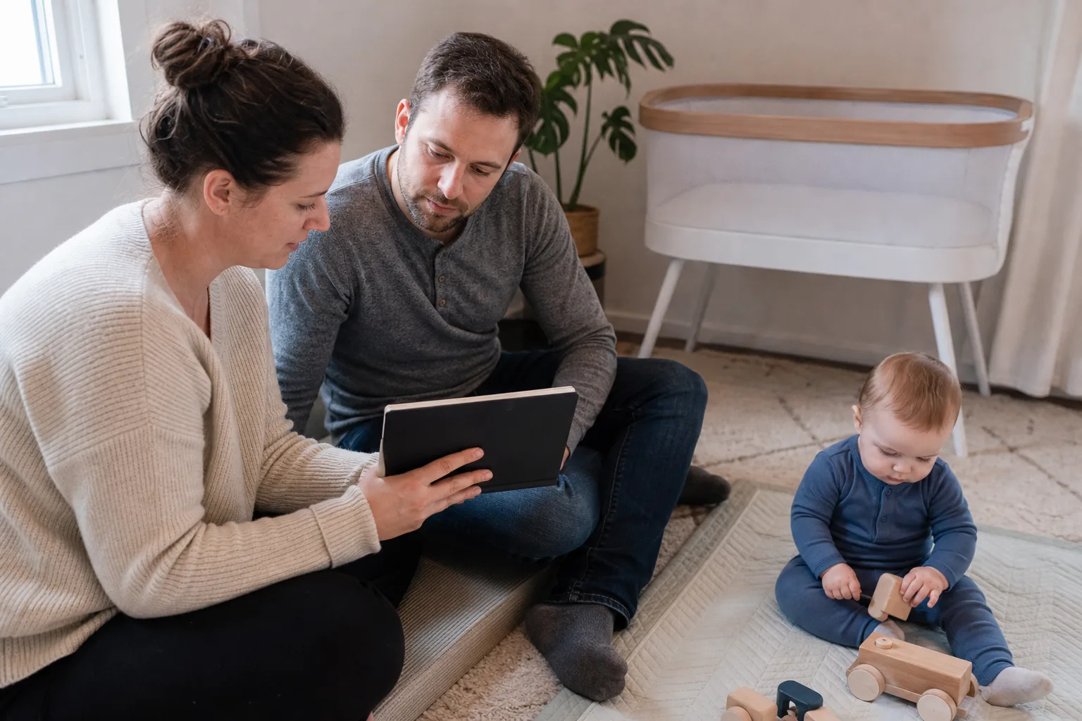 Awake adult caregivers observe an infant's night waking, feeding, or breathing in a realistic safe home or clinic setting